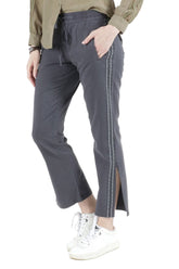 Silk boot cut pants with side tapes and slit in Washed Black