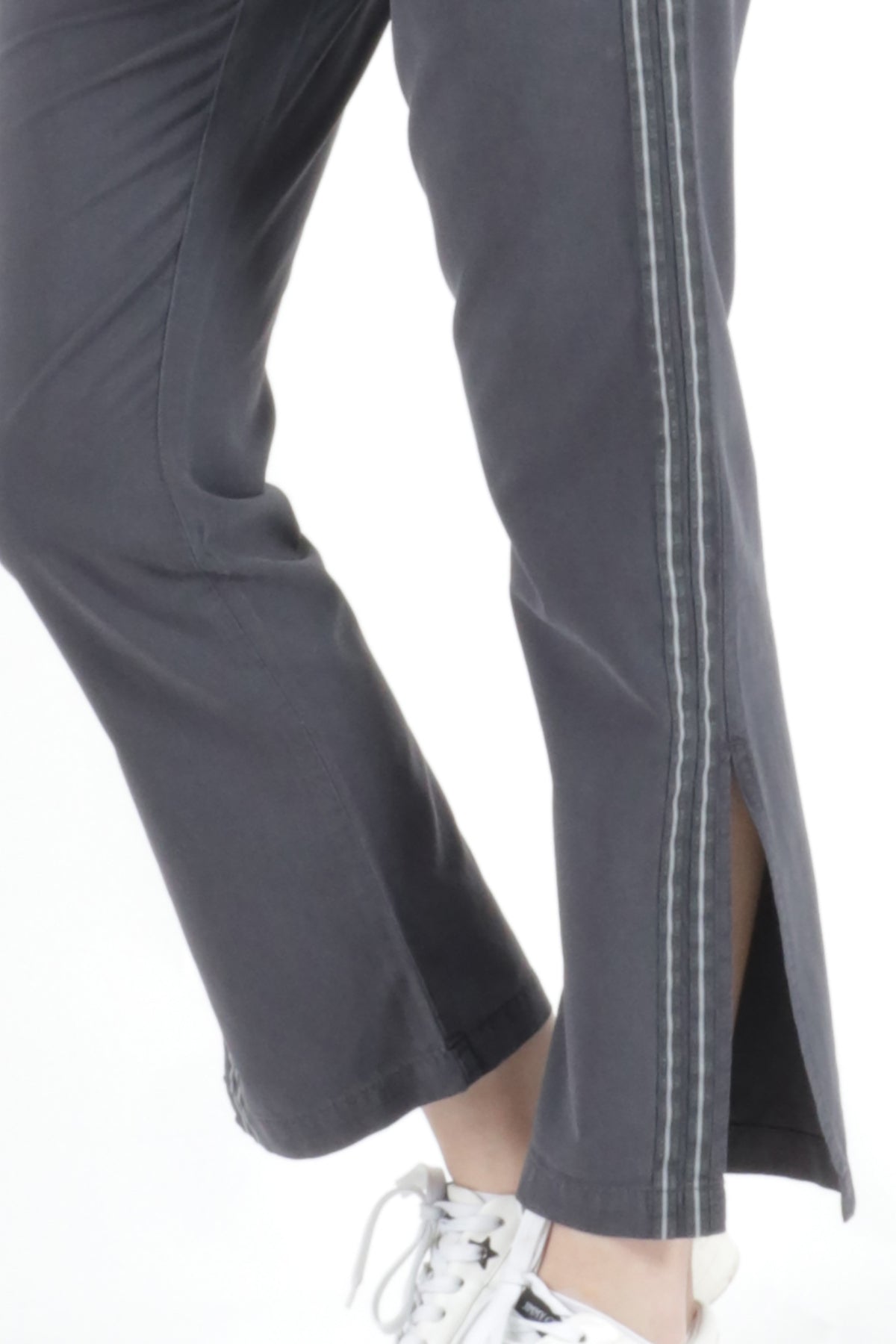 Silk boot cut pants with side tapes and slit in Washed Black