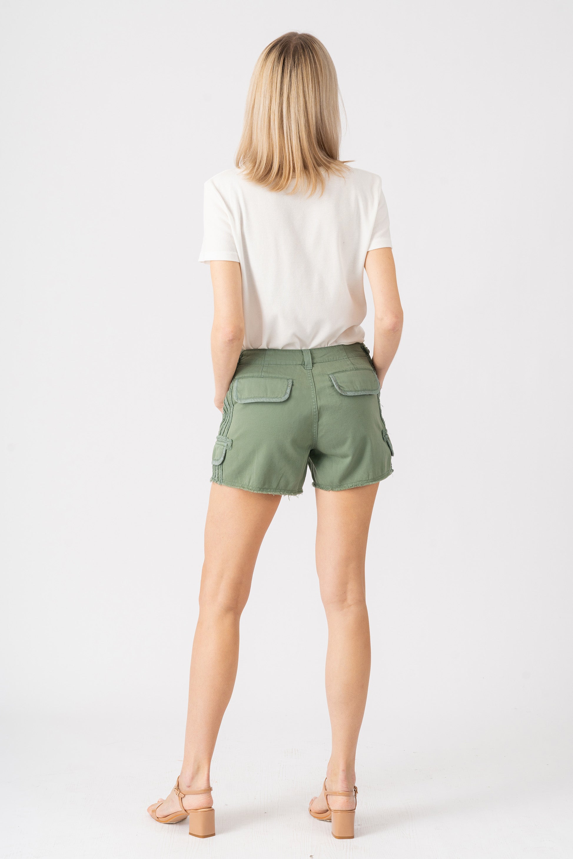 Shorts with raw stripes in Myrtle Green